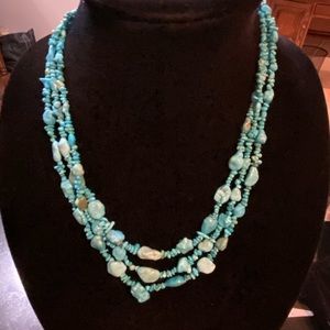 Multi strand turquoise nugget necklace.